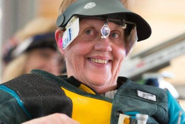Photo of Libby Kosmala dressed in her target rifle gear