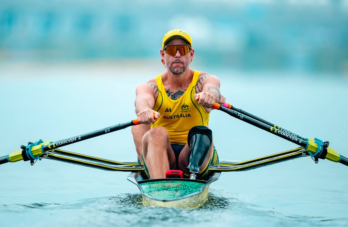 Photo of Jed Altschwager rowing on the water
