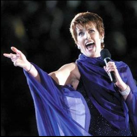 Photo of Julie Anthony singing on stage