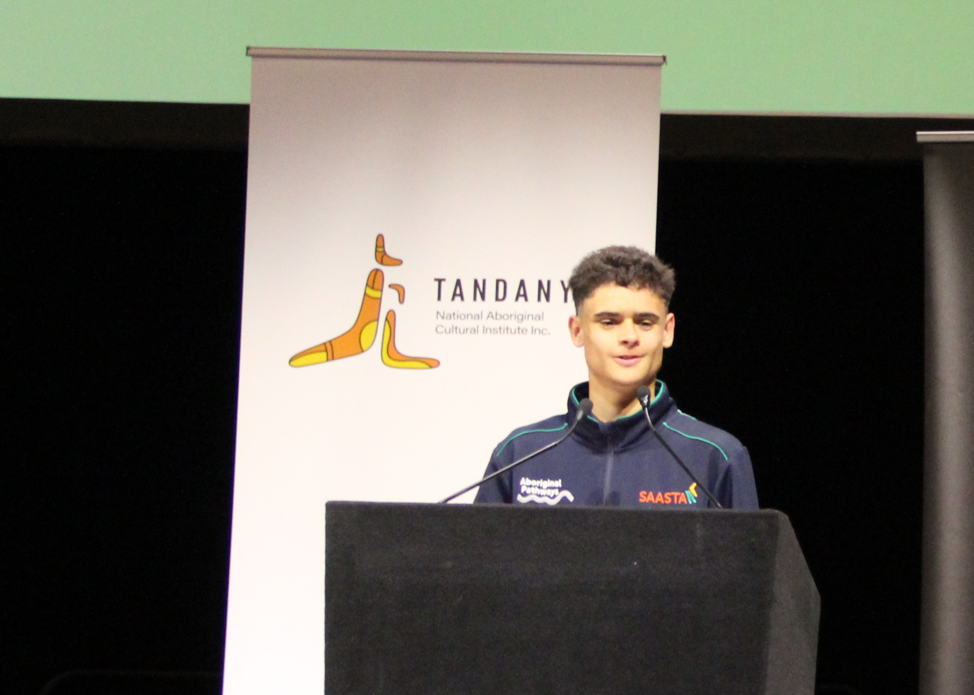 Photo of Joseph Ribbons making his acceptance speech