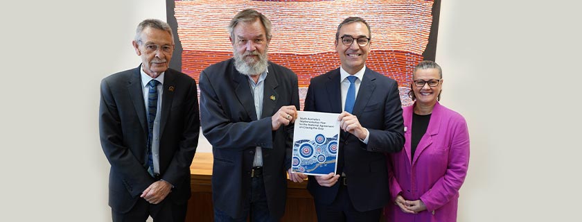 Chris Larking, Scott Wilson, Premier Steven Marshall and Tina Quitadamo holding South Australia’s Implementation Plan for the National Agreement on Closing the Gap